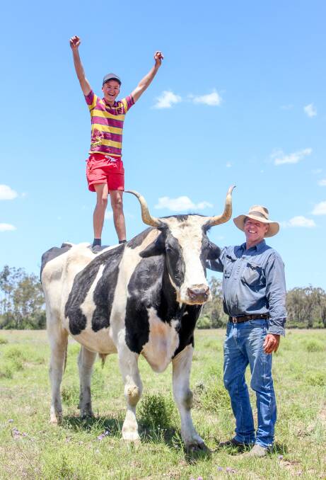Neighbour Nick Gitsham and owner Col Budden with Reggie the steer. 