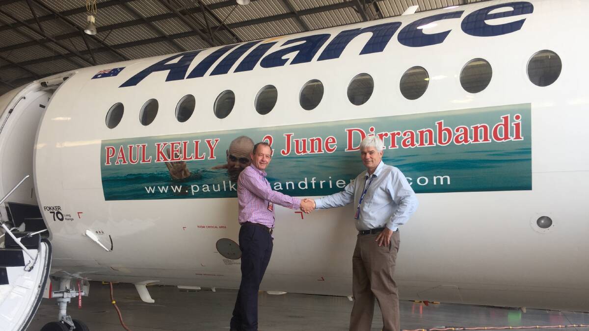 TAKING OFF: Paul Kelly and Friends concert organiser Danny Sheehan and Alliance Airlines managing director Scott McMillan.