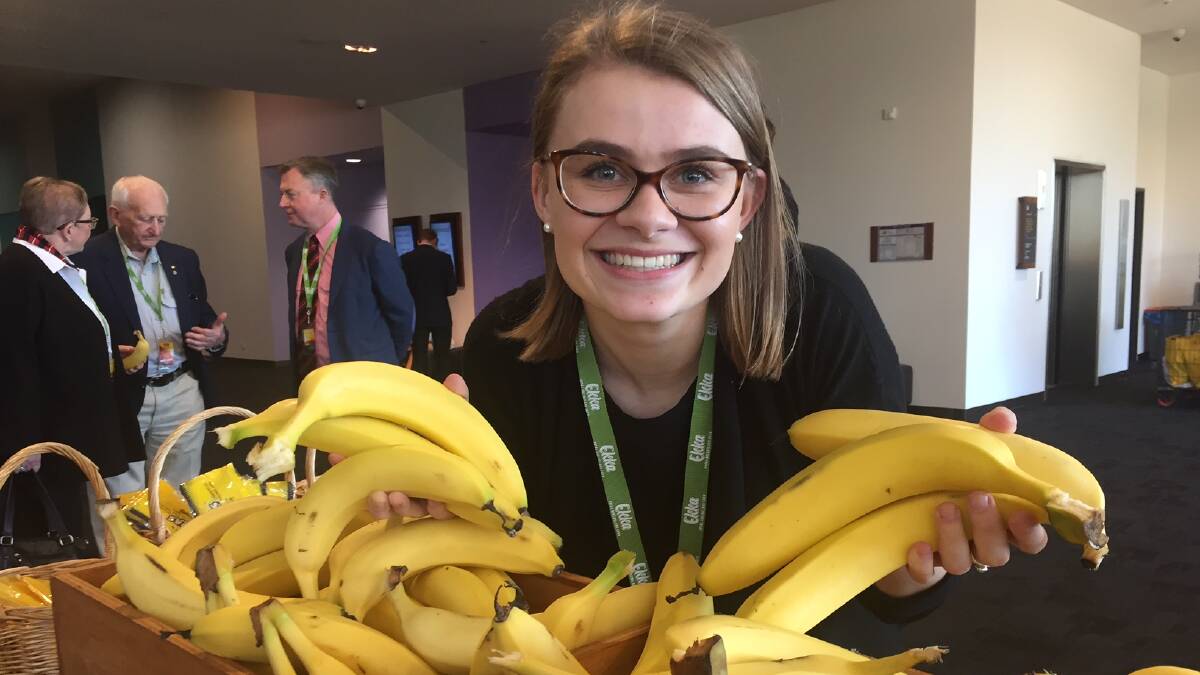 The RNA's Hannah Wilson promoting a free banana for every child at the Ekka courtesy of the Australian Banana Growers Association. 