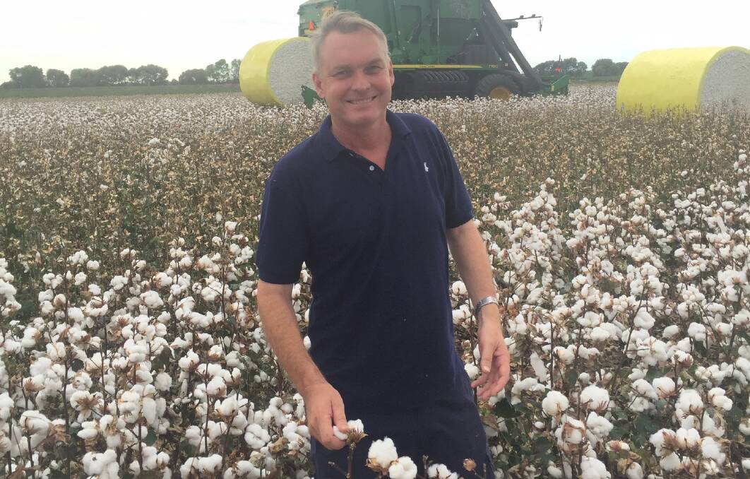 RAIN DELAY: Member for Gregory, Lachlan Millar, in the first cotton to be harvested on the Central Highlands some three weeks. The early planted crop on Orana, Emerald, was part of trial. 