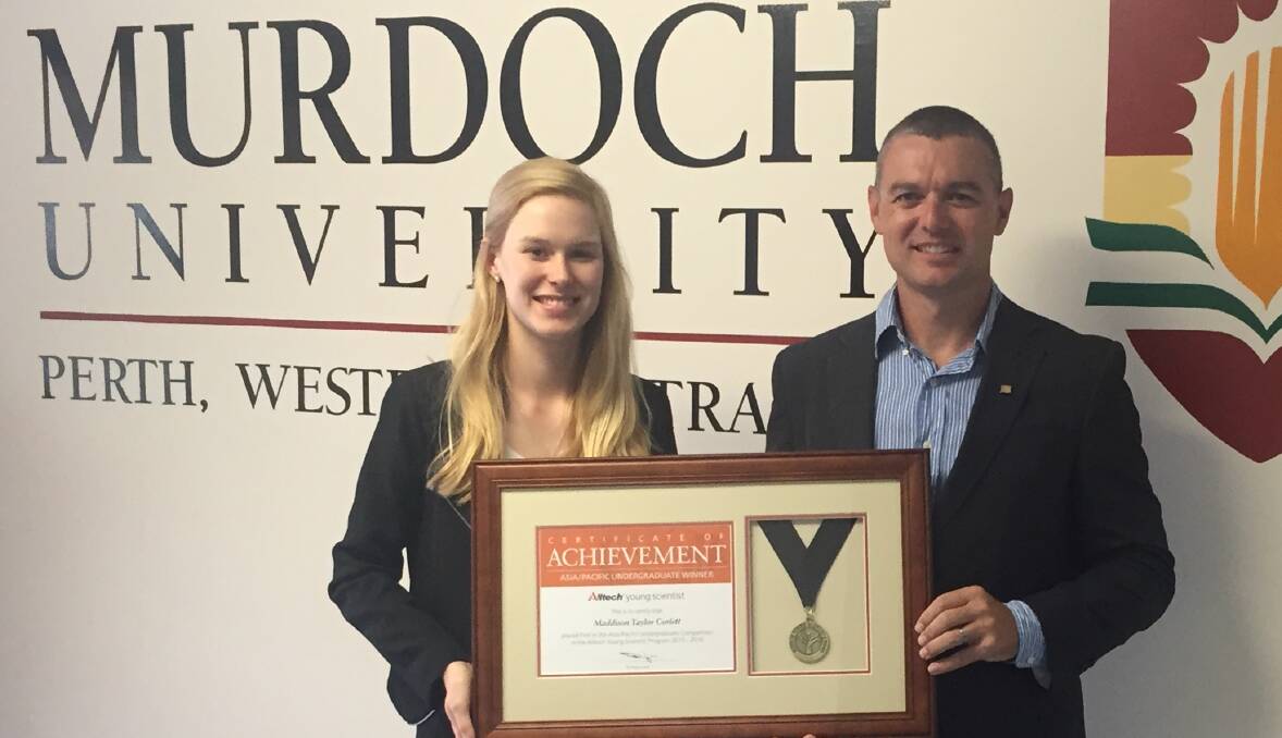 ASIA-PACIFIC WINNER: Young agri-scientist Maddison Taylor Corlett and Alltech Australia general manager (feed and food) Adam Naylor.