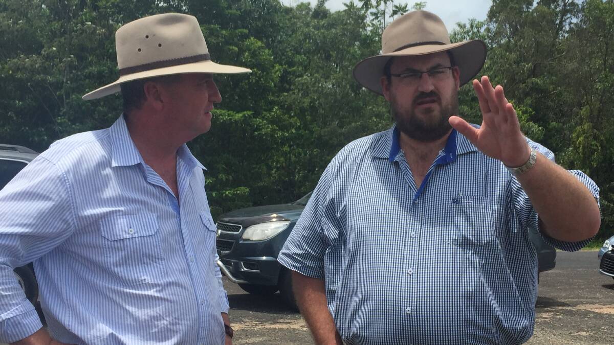 SWEET DEAL: Hinchinbrook MP Andrew Cripps (right) and deputy prime minister Barnaby Joyce talking sugar in Far North Queensland.