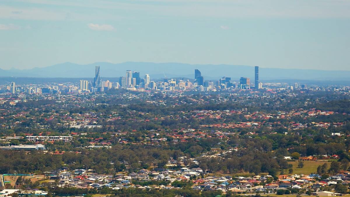 An aerial shot from above Cloverleigh Farm, Bald Hills, with the Brisbane CBD 19km in the distance.