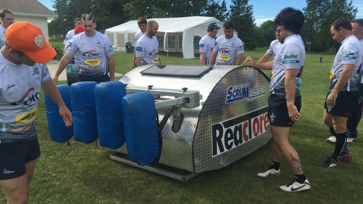 Checking out the Red Deer Titans impressive scrum machine.