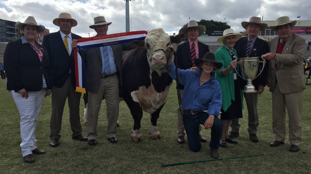 The supreme champion bull Cootharaba Vauclause, with associate judge Kate Shooter, judge Jock Laurie, NSW, Herefords Australia director Hilary O'Leary, Andrew Meara, Elders, handler Jemma Reid, JTR Cattle Company, Roslyn, NSW, with exhibitors Anne and Ian Galloway, Cootharaba Herefords, Roma, and Richard Wilson, Banana Station, Banana, who presented the JL&RS Wilson memorial trophy.