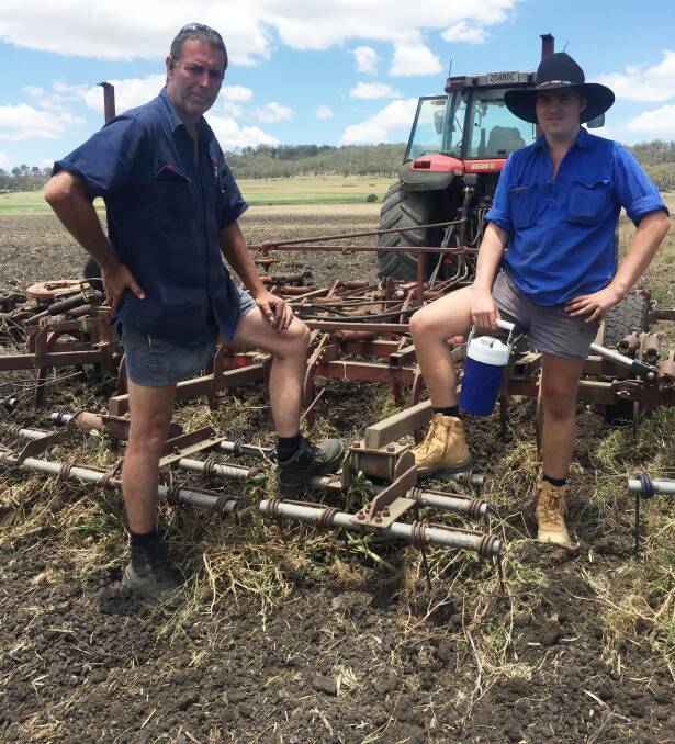 TRACTOR TIME: John Coleman and Ben Batham working up country for a forage crop on Kingsford Ridge at Sladevale near Warwick.