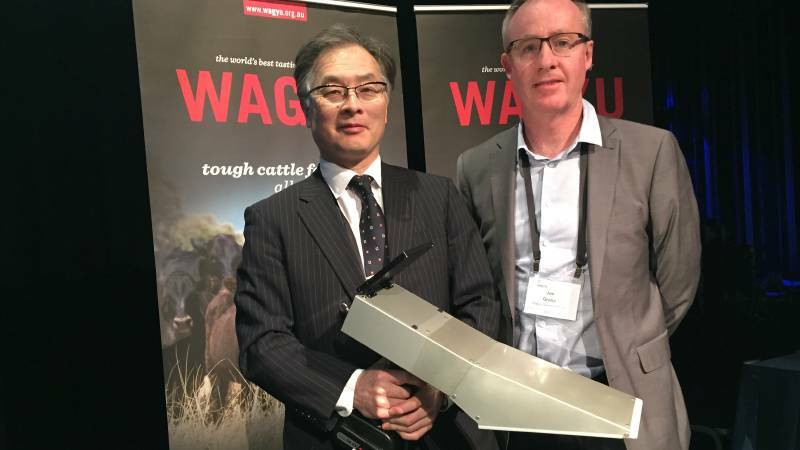 SNAPSHOT: Professor Keigo Kuchida and Dr Joe Grose with the camera used to objectively measure carcases in the Ekka's inaugural Wagyu challenge.