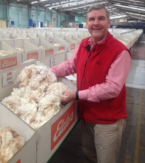 Elders Yennora-based Craig Brennan wool technical manager with samples from the Whynot, Quilpie, clip, which averaged $2007/bale. 