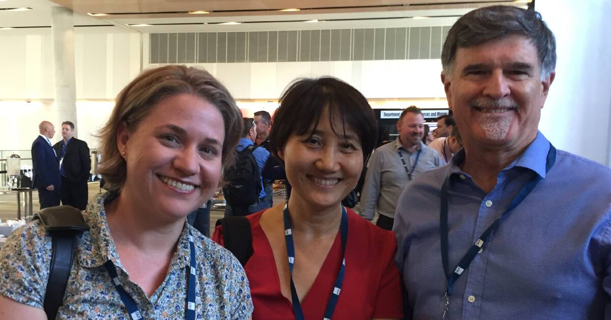 FUTURE FOCUSED: Emma Jakku and Aurong Zhang from CSIRO with John Chalmers, FarmscanAG, at the AgFutures Innovation and Investment Conference in Brisbane.