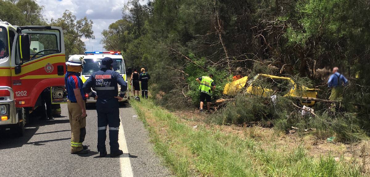 RESCUE: The vehicle left the Moonie Highway and crashed into a tree.