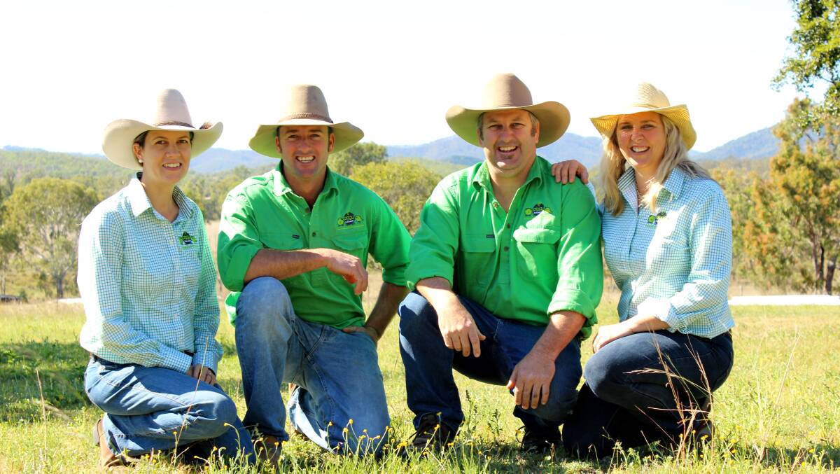 Sixth generation farmers Dean and Mason Mayne (centre) and their spouses Krystal and Kate.