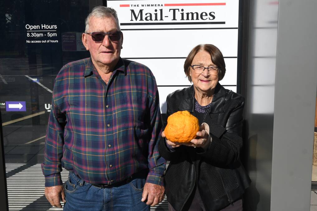WHOPPING: Norm and Margaret Hellam with their big find. Picture: ALEX DALZIEL