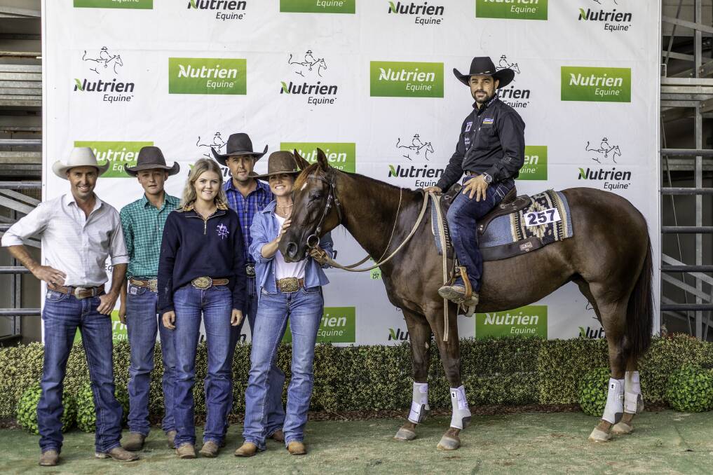 Vendor John Corbet, Adelong, with Mac, Hayley, Peter and Shari Knudsen of Haymac Campdraft Horses, Chinchilla, Qld, and the $260,000 top-selling Yaven Champagne Romance presented by Hugh Miles, Tamworth. Photo by Penwood Creations. 
