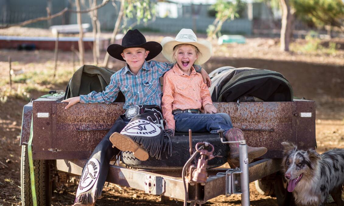 Byron Kirk, 8, and his little sister Willow, 6, are thrilled to see the Mount Isa Mines Rodeo going ahead this week. Photo: Kelly Butterworth