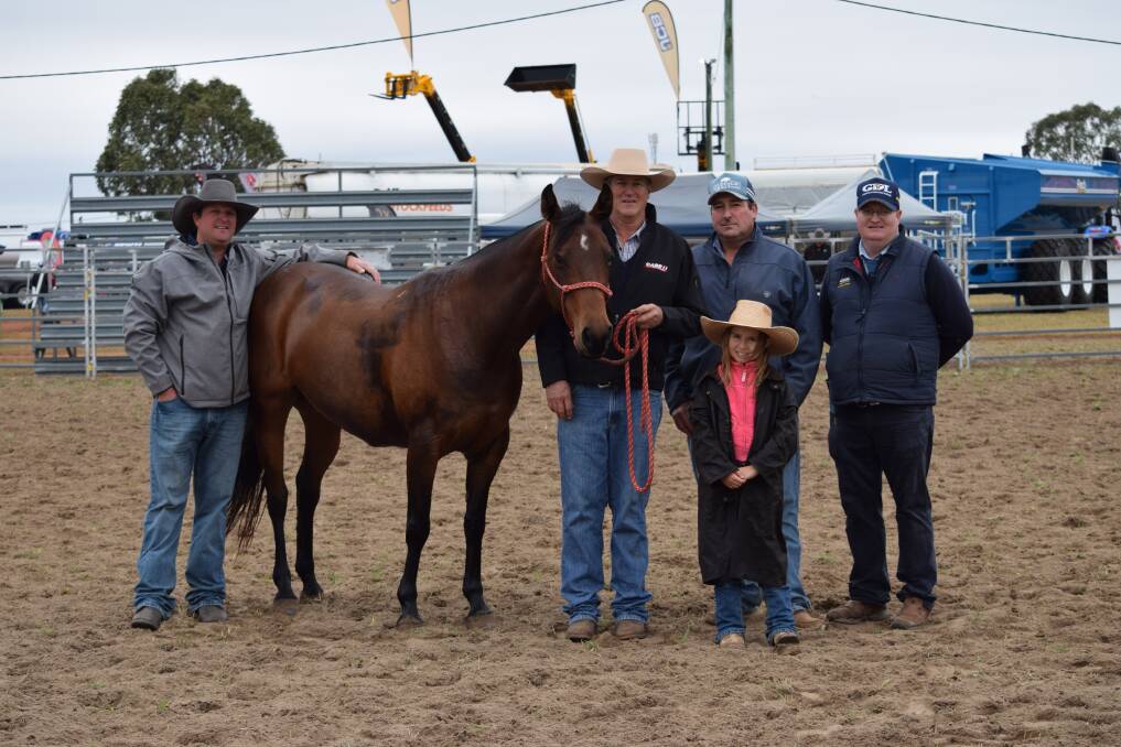 Top selling mare Kooloombah Melody with Cody O'Neill, Willows, Tim Olive, Apis Creek, Marlborough, Simon Camm, Moranbah, with daughter Harriet, and Mark Duthie, GDL Dalby. 