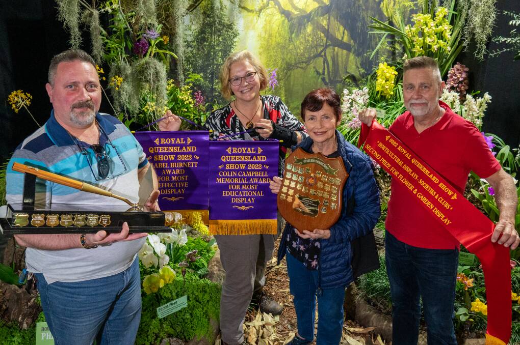 Orchid Societies of Southeast Queensland members Robert Reitano, Amanda O'Reilly, Anne McGinn and Ashley Humphry celebrate second prize. Pictures: Brandon Long