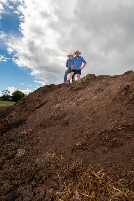 WELL TIMED: Kait and Brenden Ballon, Hillcrest, Maclagan, are building a composted cow manure pile to boost soil health. Saving on inputs is a bonus. Photos: Brandon Long