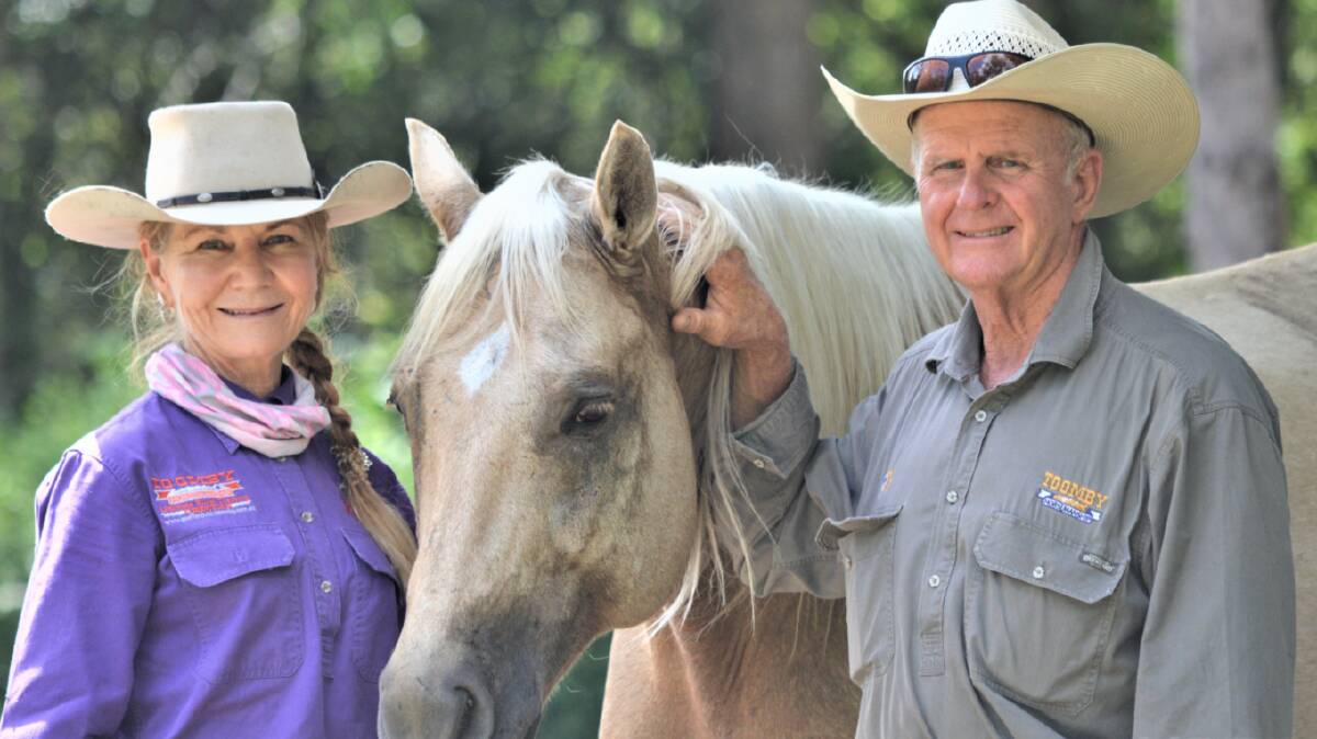 Vicki and Geoff Toomby are battling the noxious Siam weed. Picture: Toomby Horsemanship