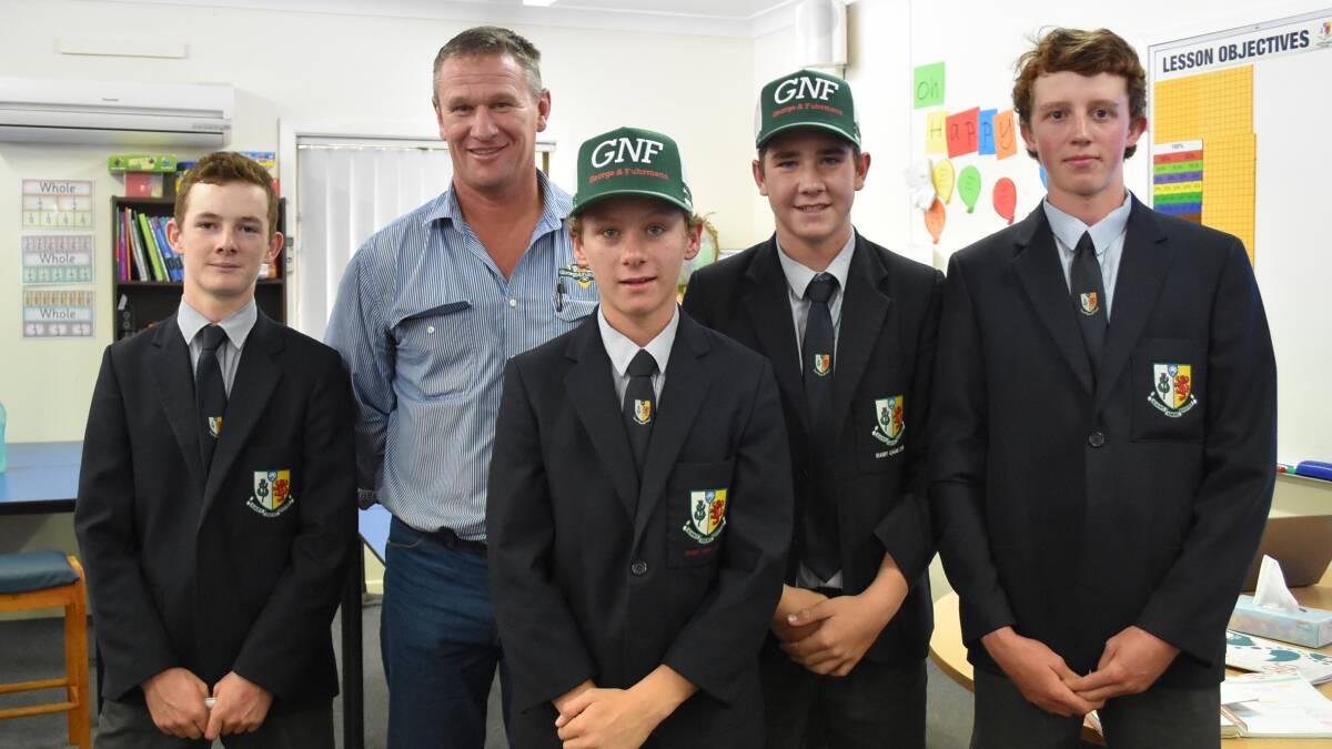 BRIGHT FUTURE: Scots PGC College students Robert Flint, George Handley, Ryan Bohm and Ben Carey with George and Fuhrmann Livestock agent Matthew Grayson. Photo: Supplied.