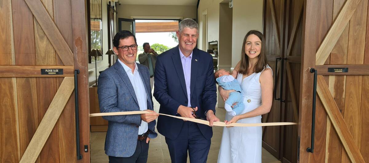 COUNTRY LUXURY: Minister Hinchliffe (centre) cuts the opening ribbon with Hazelwood Estate owners Andrew and Claire Northcott. Photo: Supplied.