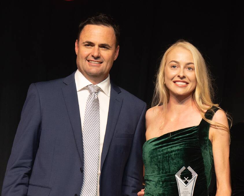 Cotton Australia chair Nigel Burnett with young achiever of the year Jessica Strauch.
