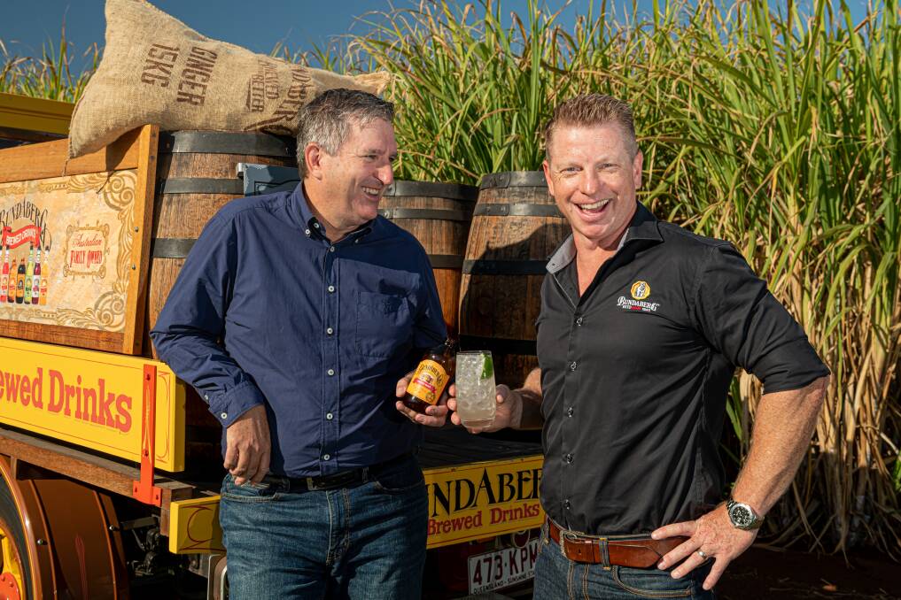 CHEERS: Bundaberg Brewed Drinks CEO John McLean (left) and Bundaberg Rum marketing manager Duncan Littler mixing business and drinks. Photo: Paul Beutel.