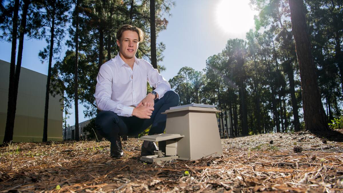 Angus Croser has built his own automated pest baiting machine. Picture: Bond University