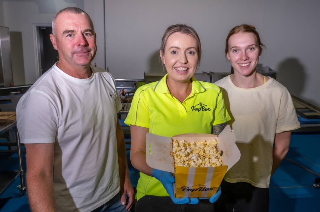 Scarecrow Foods' Mark Adamson, Jackie Davies and Maddy Weir enjoy a snack on the job. Pictures by Brandon Long