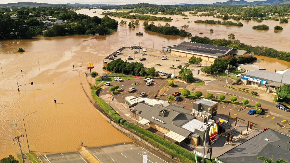 A drone capturing the flood damage to Gympie yesterday, showing the Bruce Highway heading south towards Brisbane. Photo: Infinity Flights Photography