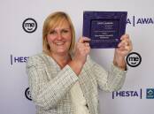 Beaudesert Hospital Nursing and Midwifery Director and Facilities Manager Jacquie Smith accepting the HESTA award for the most outstanding organisation. Picture: Medianet