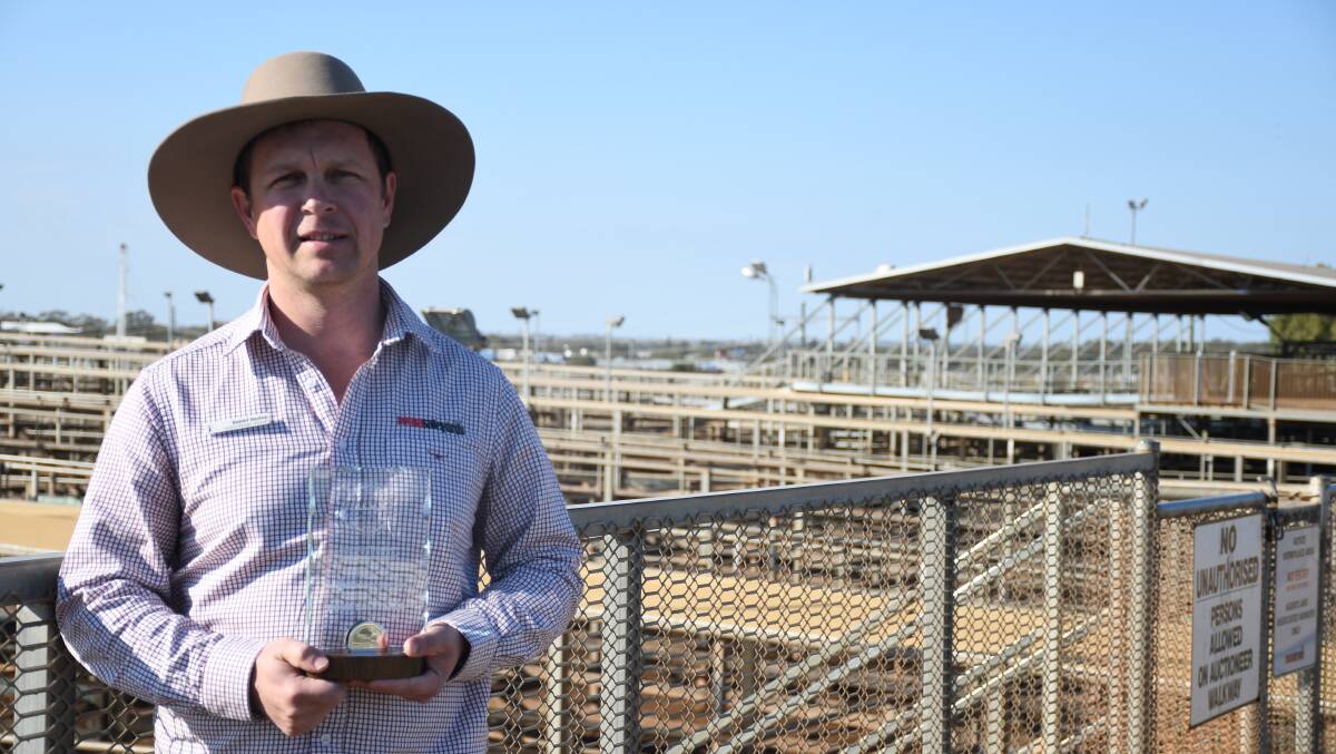 Roma Saleyards manager Daniel Haslop with the ALMA Industry Champion trophy. Picture: Clare Adcock