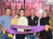 Joel and Daphne Madge, Sophie, David and Robbie Curtis of Bellevue Dorpers claim their ribbons at the 2022 Ekka prime lamb competition. Picture: Clare Adcock