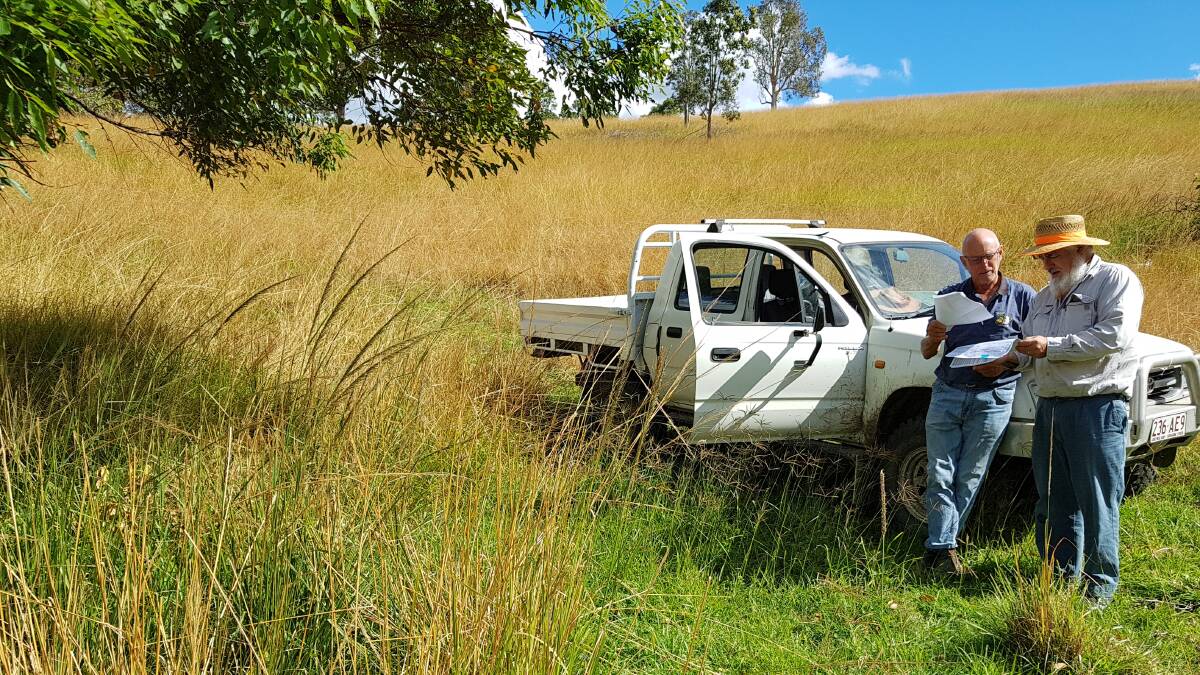 Peter Thompson, Manager, Elgin Station, Conondale and Weed Scientist Joe Vitelli, Biosecurity Qld discussing giant rats tail (GRT) grass management using a wick-wiper. Photo: AgForce