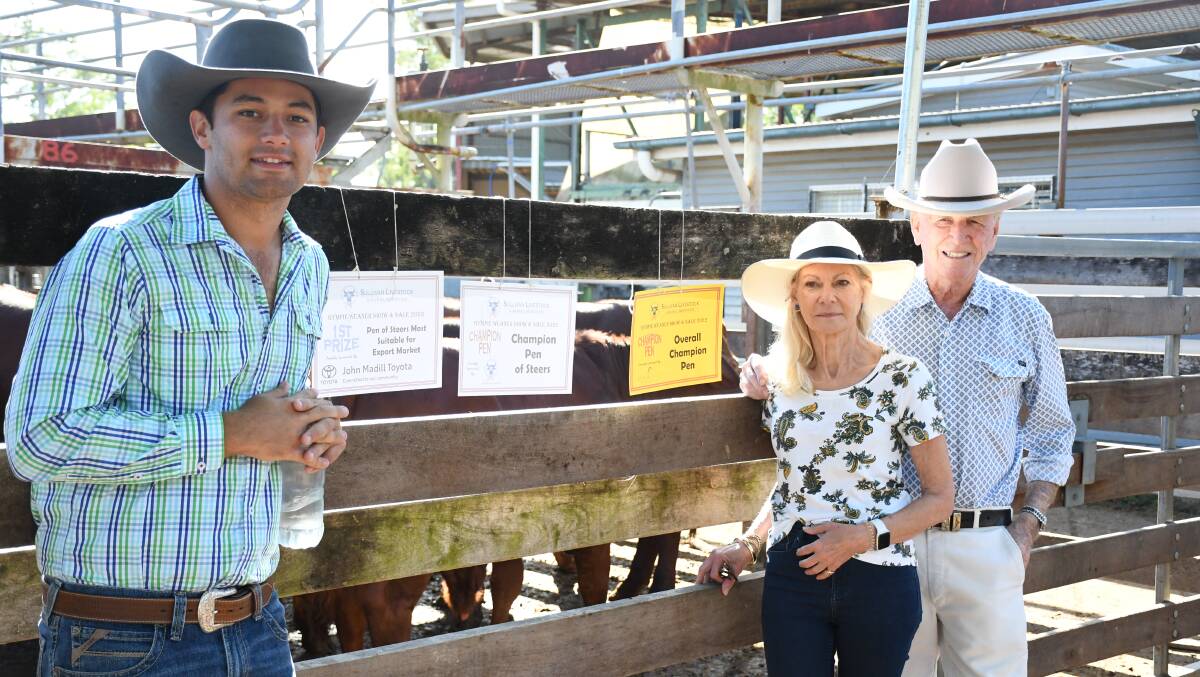 Riversleigh Pastoral's Mitch Davis, Trixi Ryder and Peter Shadforth with their numerous awards at the Gympie weaner sale.