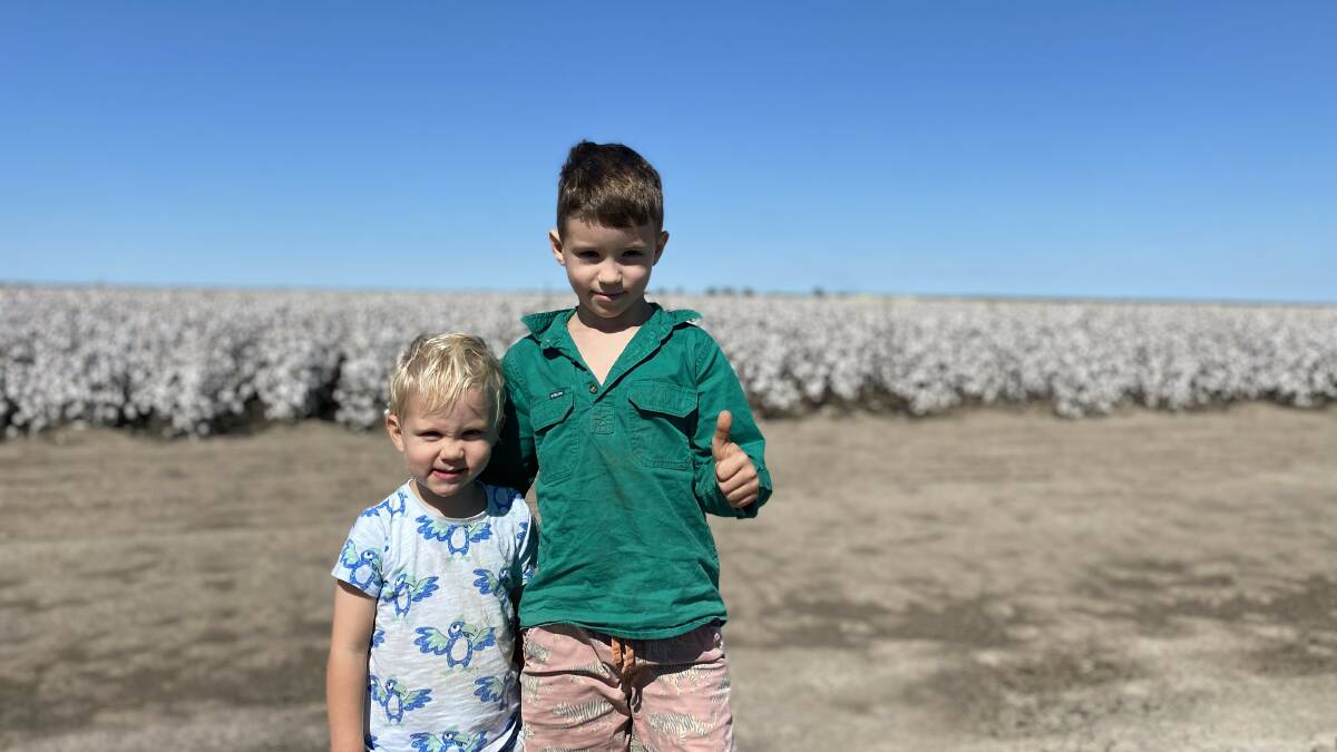 Tommy, 2, and Darcy, 7, were pretty pleased with the crop. Picture: Luke Stower
