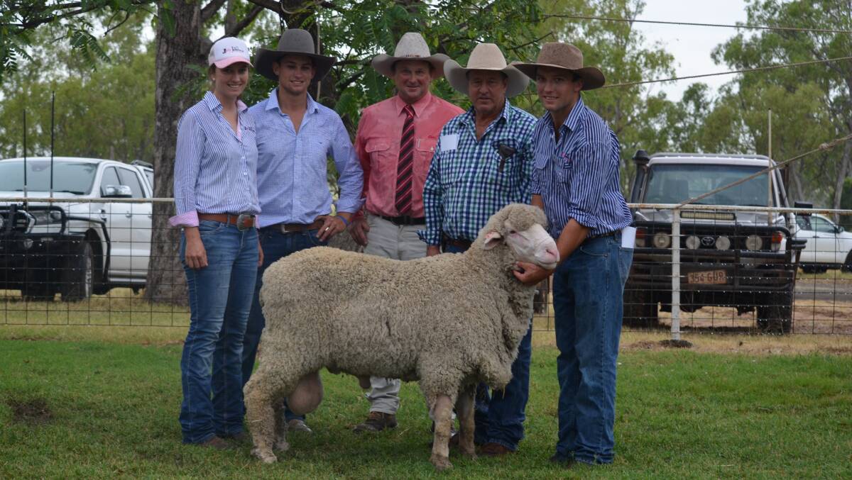 Felicity, Lachie and Charlie Brumpton, with Elders agent Dave Phiilips and David Sisson who purchased the top priced Jolly Jumbuck ram for $4400. Photo: Clare Adcock
