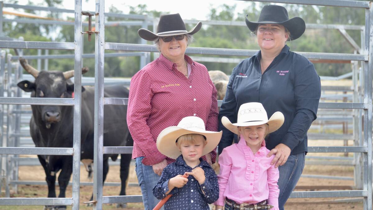 Kerri and Kandiece King, with Madeline, 5, and Brydan, 3, and one of their best bulls, Suga Boom Boom. Photos: Clare Adcock