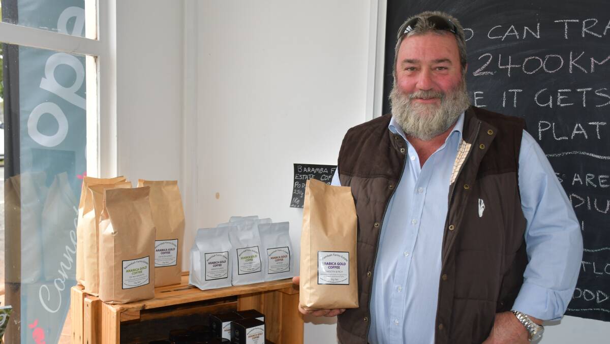 Barambah Farms Estate Jeff Klein with a bag of his beloved coffee beans at the Farm2Fork store.