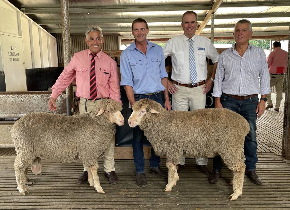 The two $5500 top-priced rams with Elders Walcha branch manager Tom Henry, Eddy Cordingley, Lorelmo stud, Paul Dooley, auctioneer and Bill Walker, Classings sheep classing and breeding consultancy, Murray Bridge, South Australia. Picture by Simon Chamberlain