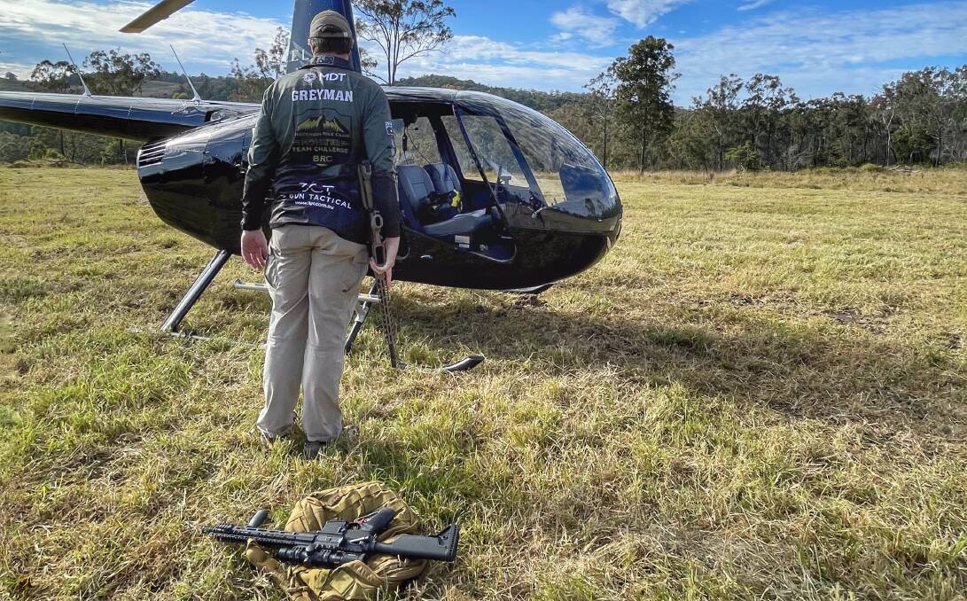 Adam Quinn has been working in pest management for a decade and travels Australia dispatching invasive animals. Picture: Supplied Greyman Ops