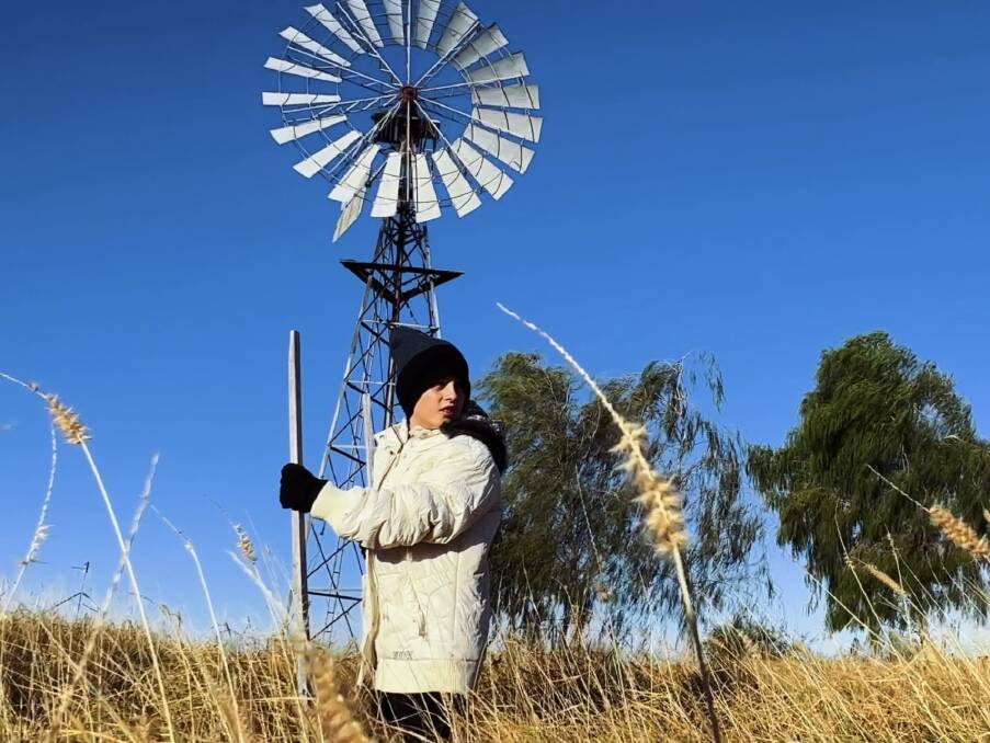 Nate Dagan 11, will hopefully be swapping windmills for ski lifts if the outback children head to the snow for their school camp. Picture: Josh Arnold