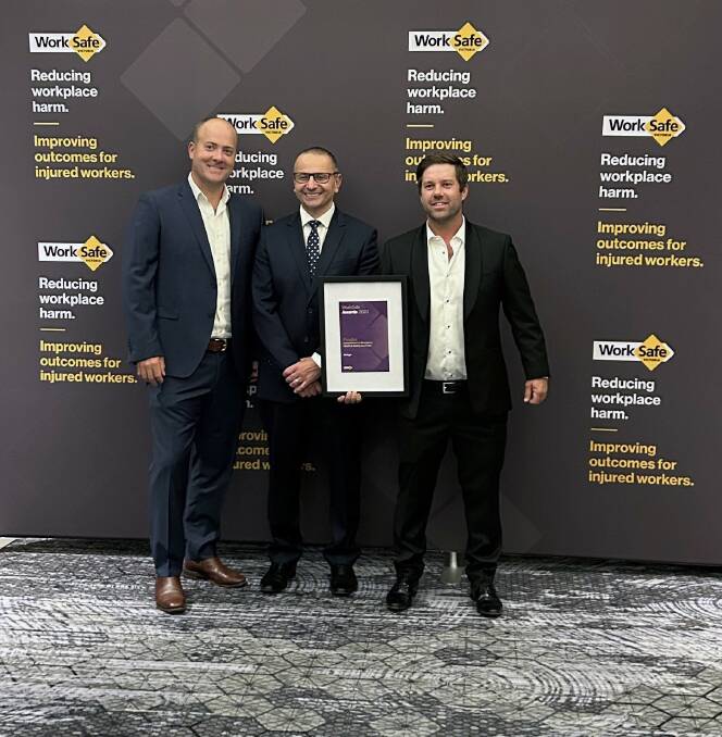 James, left, and Paul Diamond, right, AirAgri, accept their award from Worksafe Victoria chief executive officer Joe Calafiore at the 34th annual Worksafe Awards. Picture supplied