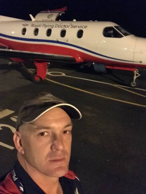 Adam Booker with the Royal Flying Doctor Service aircraft for the NT. Picture: supplied