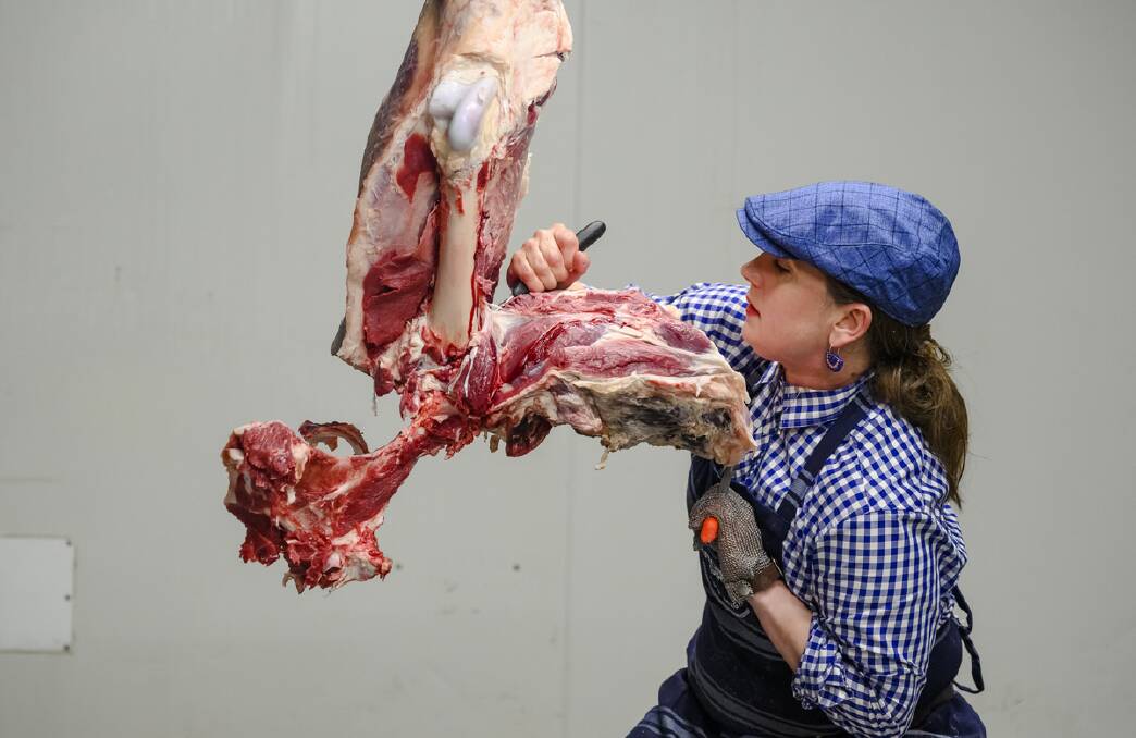 Butcher Girl Alison breaking down a hindquarter of beef. Picture: supplied