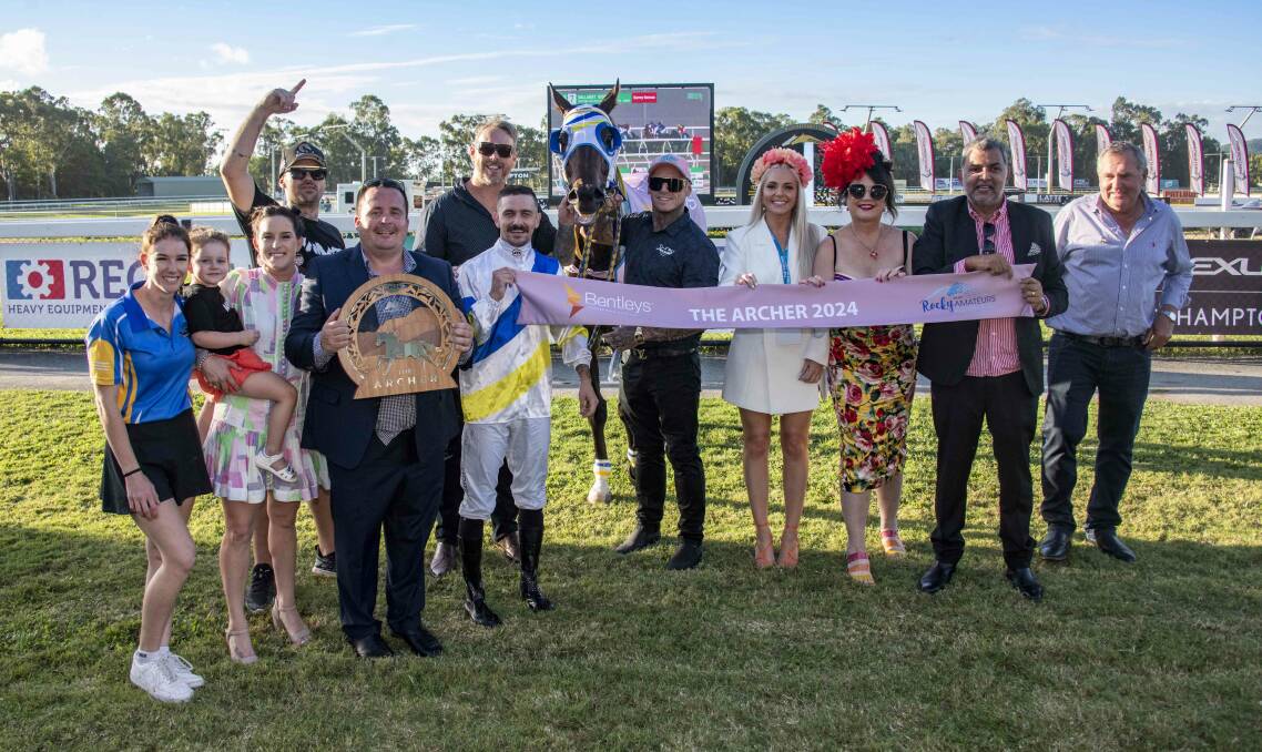 Archer winner, Namazu, and jockey, Ashley Butler, with its happy owners after its win. Picture: Caught in the Act Photography CQ