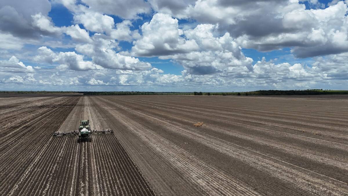 A drone shot of a harvester in action in Mark and Megan Baker's mungbean crop. Picture: Macklin Baker