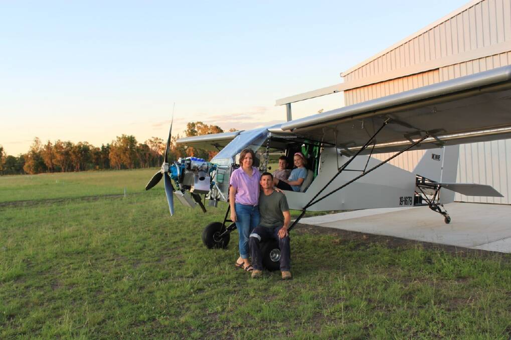 Cameron 'Sparrow' Obst with wife Taneal, son Connor, 10, and daughter Aleera, 9, with the Kangawallafox he built to help raise money for the RFDS with a record-setting event in March 2024.