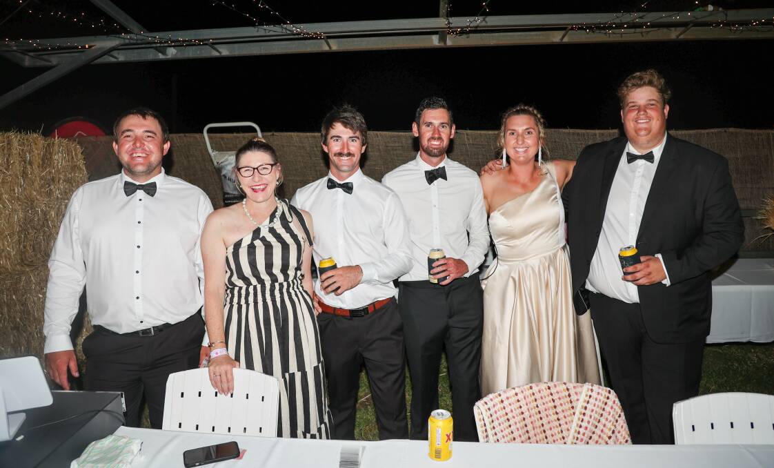 Ready to roll, members of the organising group of the inaugural Ballin' on the Balonne - Craig Murray, Marie Murray, Brendan Murray, Nathan Winning, Tayla Price and Luke Thompson at the raffle table. Picture: Clancy Sinnamon / CC Donut Productions