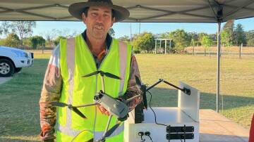 Bundaberg Feral Pest Control owner Darren Pratt with the thermal imaging drone which he said allowed him to quickly locate and dispatch feral pests including pigs, wild dogs and hares. Picture: Supplied