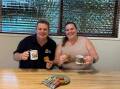 Mount Isa CWA member Amanda Turner shared a batch of Anzac Biscuits with Mount Isa RSL president Troy Hartas, a 20 year veteran who was in the Royal Australian Navy. Picture: Supplied